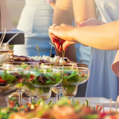 Beautifully decorated catering banquet table with different food Beautifully decorated catering banquet table with different food